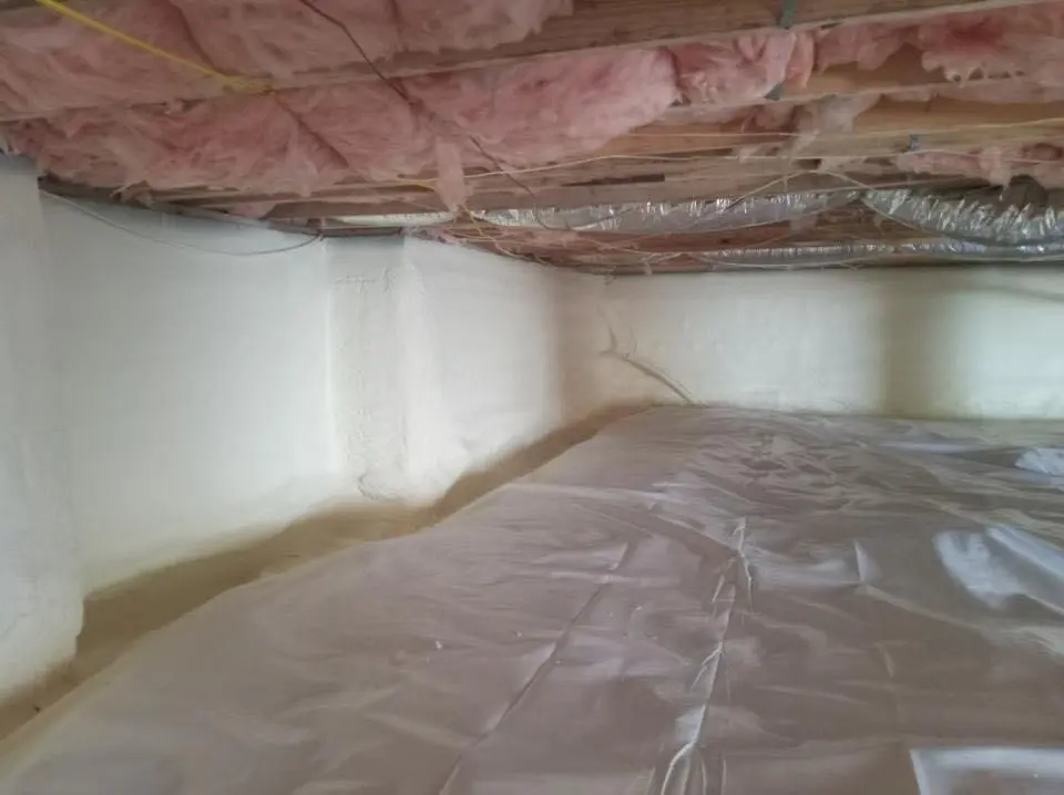 Crawl space encapsulation with closed-cell spray foam for Flat Roof Repair in Maquoketa